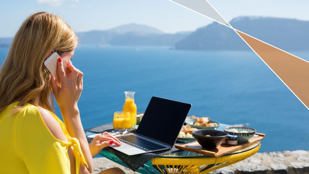 Keep Your Summer Marketing Campaigns Thriving_Lady On Laptop Looking at the Sea